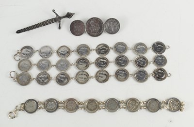 Lot 45a - A group of silver coinage jewellery comprising...