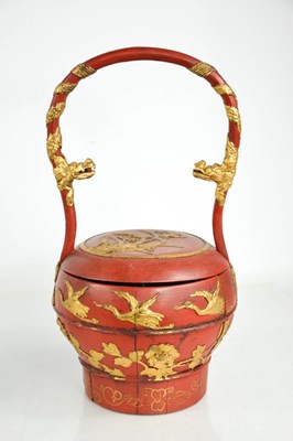 Lot 186 - A Chinese red lacquered wedding handbag circa...