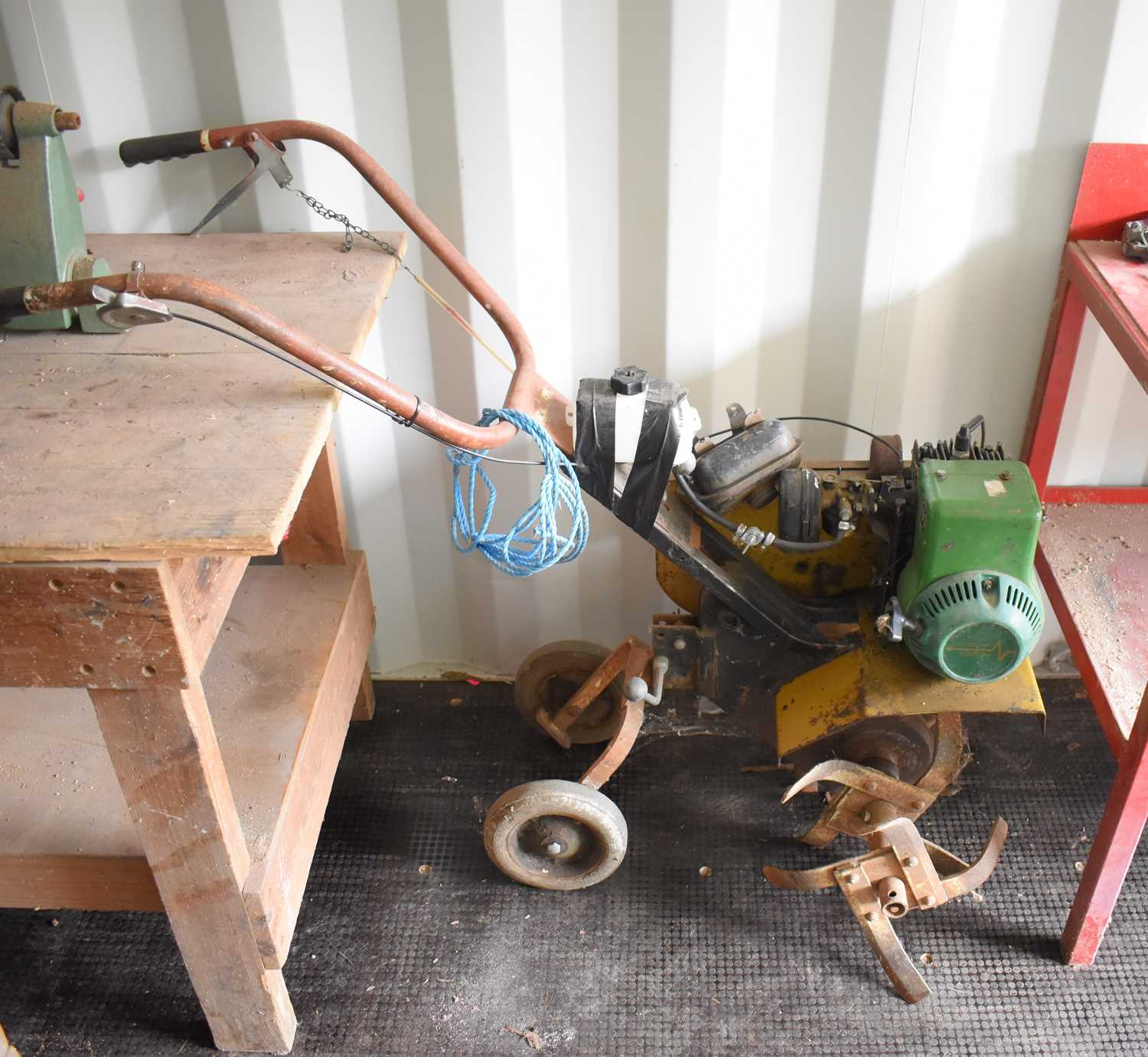 Lot 333 - A vintage petrol rotavator together with a...