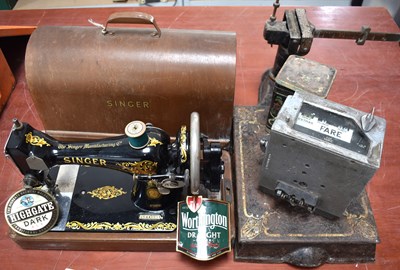 Lot 296 - A vintage Singer Sewing Machine, model 128K...