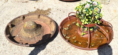 Lot 301 - Two cast iron Mexican hat pig troughs, one...