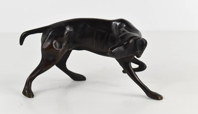 Lot 63 - A small bronze of a pointer or gun dog,...