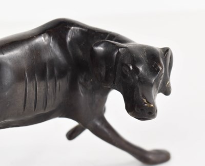 Lot 63 - A small bronze of a pointer or gun dog,...