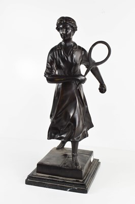Lot 62 - E. Loisauy: a bronze figure of a female tennis...