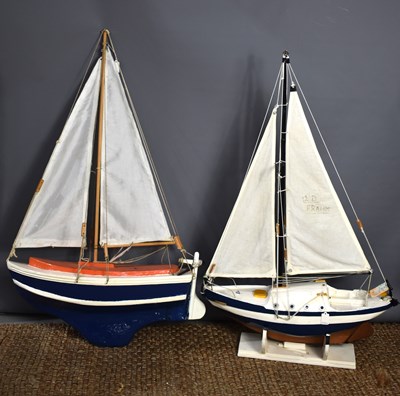 Lot 223 - Two hand built pond yachts, painted and rigged,...