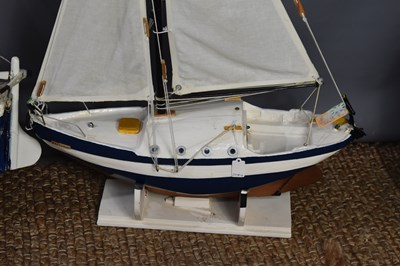 Lot 223 - Two hand built pond yachts, painted and rigged,...