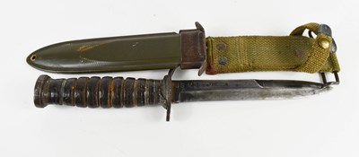 Lot 170 - A WWII M 3 U.S. army trench knife, marked US...