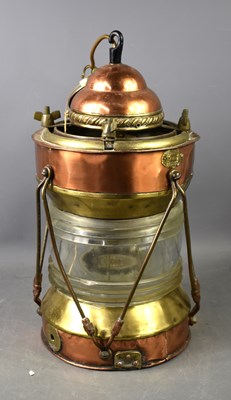 Lot 286 - A copper and brass cased ships lantern, makers...