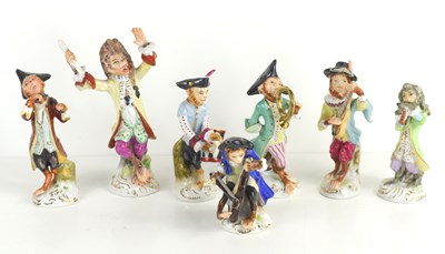 Lot 108 - A group of seven Meissen style ceramic figures...