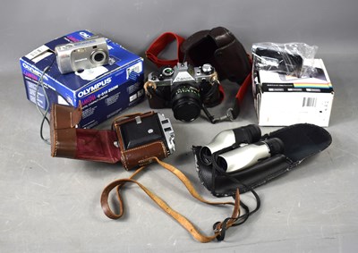 Lot 309 - A Canon AE-1 programe SLR camera together with...