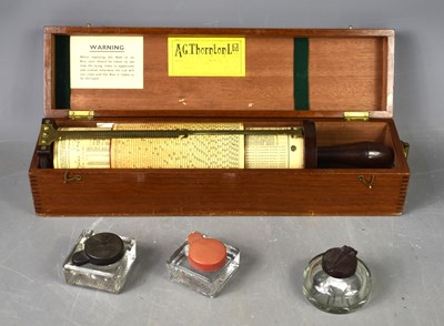 Lot 181 - A cylinder slide rule with bakelite handle,...