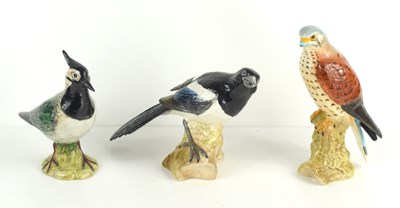 Lot 106 - A group of three Beswick birds comprising of a...