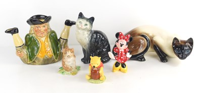 Lot 103 - A group of animal and other ceramic figures to...