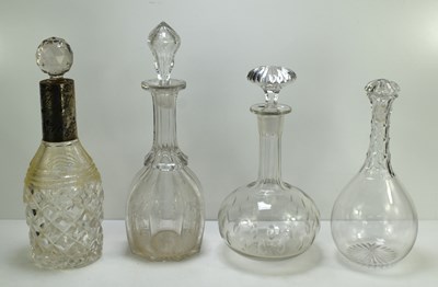 Lot 120 - A group of four decanters, including one with...