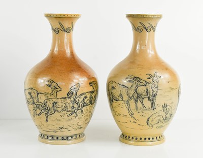 Lot 135 - A pair of Hannah Barlow Doulton Lambeth vases,...