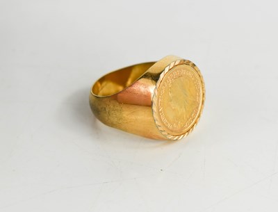 Lot 50 - A Gentleman's gold plated ring set with plated...