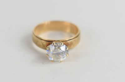 Lot 51 - A 14k gold solitaire ring, set with iridescent...
