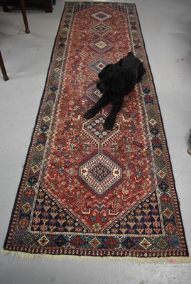 Lot 351 - A Middle Eastern blue ground wool runner, with...