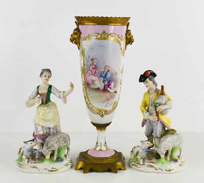 Lot 121 - A pair of Sampson porcelain figures of a...