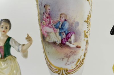Lot 121 - A pair of Sampson porcelain figures of a...