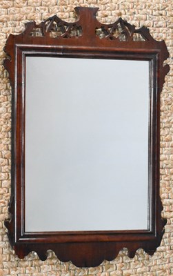 Lot 285 - A 19th century mahogany fretwork mirror, 69 by...