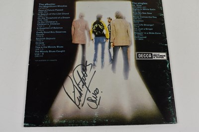 Lot 67 - A Moody Blues "Out of This World" autographed...