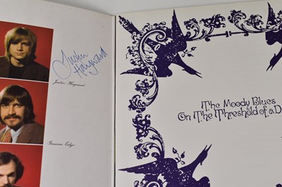 Lot 5 - Two autographed Moody Blues LP records, both...