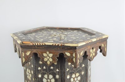 Lot 612 - An early 20th century Indian hexagonal table...