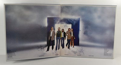 Lot 69 - An autographed copy of The Moody Blues "Octave"...