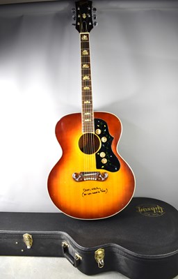 Lot 85 - A Gibson style acoustic guitar with hardcase,...