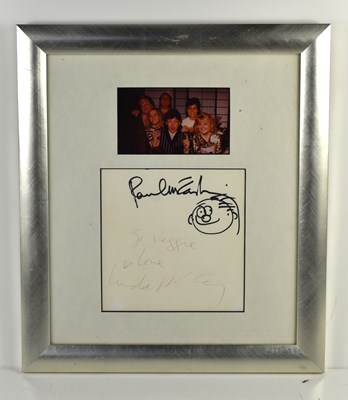 Lot 91 - A framed autographed card signed by Paul...