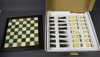 Lot 137 - An Italian alabaster complete chess set in its...