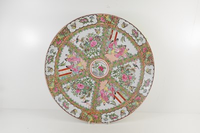 Lot 30 - A Canton Famille Rose charger, decorated...