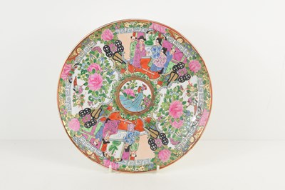 Lot 30 - A Canton Famille Rose charger, decorated...