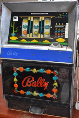 Lot 124 - A Bally one arm bandit fruit machine, later...