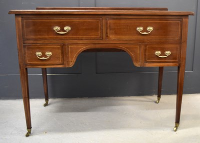 Lot 486 - An Edwardian mahogany dressing table, having...