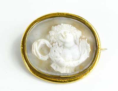 Lot 127 - A Georgian gilt metal cameo brooch, carved in...