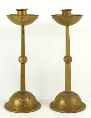 Lot 396 - A pair of WMF Jugendstil brass candlesticks,...