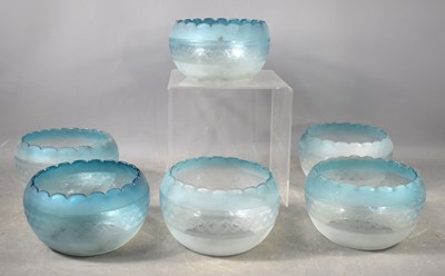 Lot 443 - A set of six early 20th century blue glass...