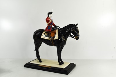 Lot 352 - A Coalport Trooping of the Colour, sculpted by...