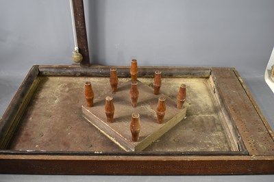 Lot 151 - An antique table top pub skittles game,...