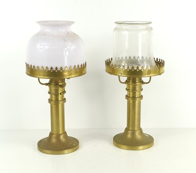 Lot 440 - A pair of Arts and Crafts brass candle stands,...