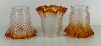 Lot 452 - A group of three vintage swirl glass lamp or...