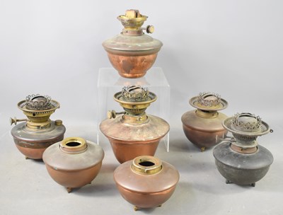 Lot 449 - A group of seven Benson copper lamp bases,...