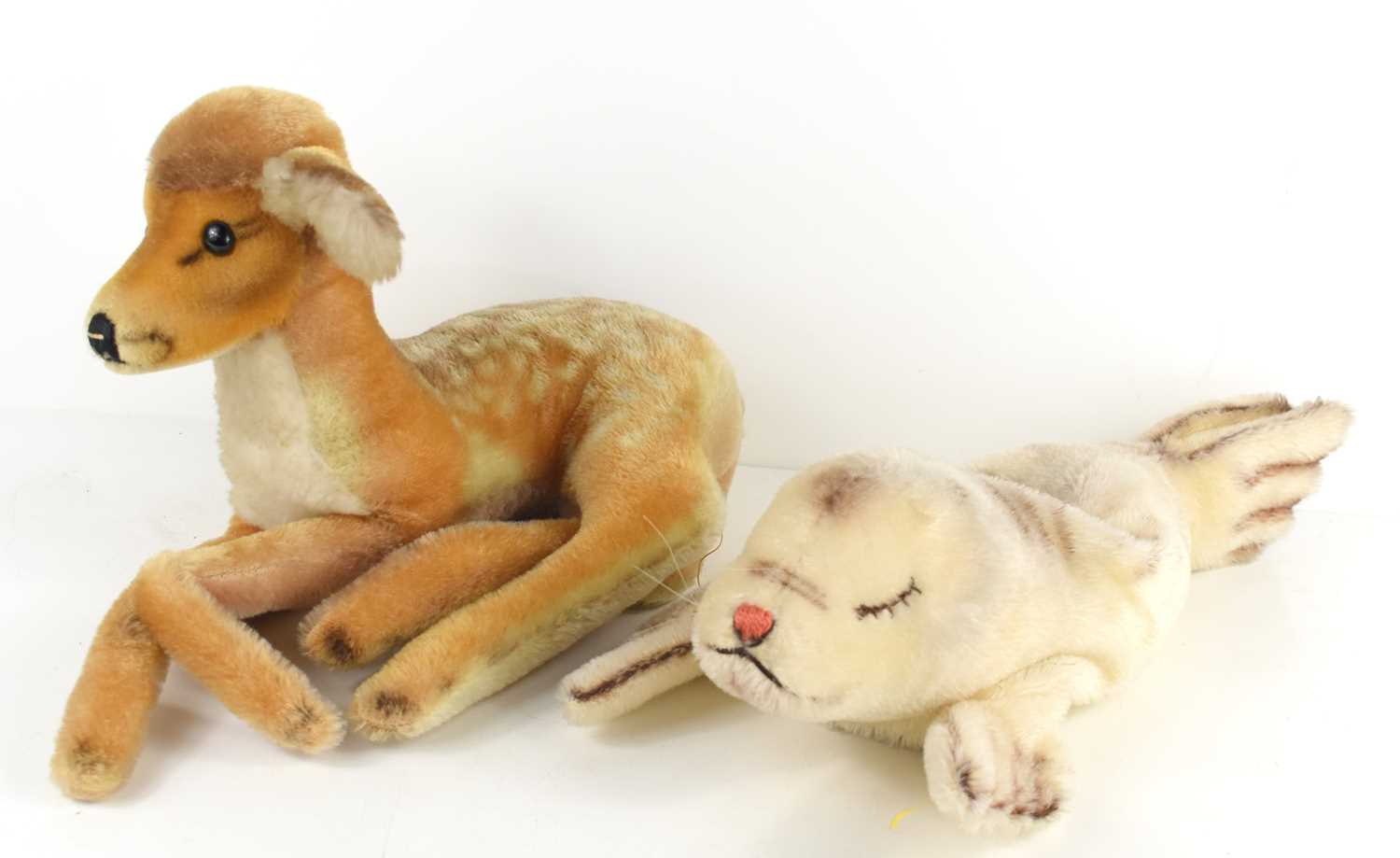 Lot 153 - A vintage Steiff fawn deer laying down...