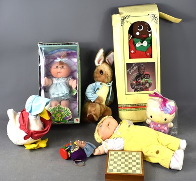 Lot 132 - A group of soft toys and dolls to include Eden...