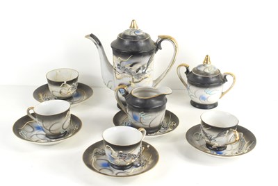 Lot 281 - A vintage Japanese Dragonware tea set with...