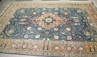 Lot 493 - A large Persian carpet, likely Kashan, the...