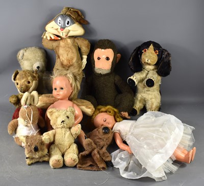 Lot 164 - A group of dolls and soft toys, comprising two...