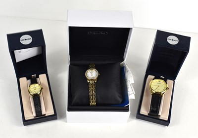 Lot 232 - A Seiko "Solar" ladies watch together with two...